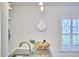 Bright kitchen featuring granite countertops, stainless steel appliances, and white cabinetry at 115 Standish Dr, Chapel Hill, NC 27517
