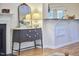 Elegant living room with fireplace, decorative mirror, and stylish furniture at 115 Standish Dr, Chapel Hill, NC 27517