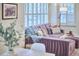 Bright living room featuring stylish furnishings, including a plush sofa and modern decor at 115 Standish Dr, Chapel Hill, NC 27517