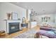 Inviting living space with a fireplace, dining area, and comfortable seating at 115 Standish Dr, Chapel Hill, NC 27517