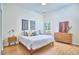 Inviting bedroom with hardwood floors, crown molding, and plenty of natural light at 115 Standish Dr, Chapel Hill, NC 27517