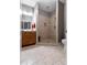 This bathroom features tile flooring and a glass shower, combining style and functionality at 120 Wood Lake Dr, Fuquay Varina, NC 27526