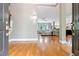 Inviting foyer showcasing gleaming hardwood floors and an open floor plan into the living area at 120 Wood Lake Dr, Fuquay Varina, NC 27526