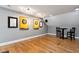 Spacious game room with hardwood floors, dart boards, and pub table set at 120 Wood Lake Dr, Fuquay Varina, NC 27526