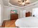 Main bedroom featuring hardwood floors, modern lighting, and a spacious layout at 120 Wood Lake Dr, Fuquay Varina, NC 27526