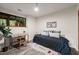 This bedroom features a comfy bed, desk, decor, and natural light, creating a relaxing retreat at 1213 Blackwood Mountain Rd, Chapel Hill, NC 27516