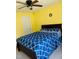Comfortable bedroom with ceiling fan and natural light from the bright windows at 1240 Grenshaw Dr, Morrisville, NC 27560