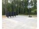 Community park featuring a basketball court and mailboxes surrounded by lush trees at 1240 Grenshaw Dr, Morrisville, NC 27560