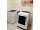 Well-equipped laundry room with a modern Samsung washer and dryer set, as well as convenient shelving at 1240 Grenshaw Dr, Morrisville, NC 27560