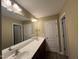 A view of a bathroom with a double sink and mirror at 125 Occidental Dr, Holly Springs, NC 27540