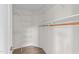 Walk-in closet with wire shelving and hardwood floors for maximum organization at 125 Occidental Dr, Holly Springs, NC 27540