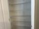 Linen closet with wire shelving for storage at 125 Occidental Dr, Holly Springs, NC 27540