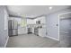 Modern kitchen with stainless steel appliances, white cabinetry, and new countertops at 1317 Proctor St, Rocky Mount, NC 27801