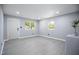 Bright, freshly painted living room with new flooring and windows at 1317 Proctor St, Rocky Mount, NC 27801