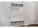 Bright mudroom features storage cubbies, hooks, and a built-in bench at 1632 Ferntree Ct, Morrisville, NC 27560