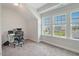 Office space featuring a desk with a chair and natural light at 1632 Ferntree Ct, Morrisville, NC 27560