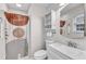 Updated bathroom with a vanity, large mirror, and a shower with a decorative curtain at 1703 Cranston Road Rd, Garner, NC 27529