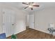 This room boasts a modern ceiling fan and an extra door for easy entry and exit at 1703 Cranston Road Rd, Garner, NC 27529