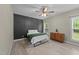 Comfortable bedroom featuring a decorative wall and ample natural light at 179 Carrie Dr, Archer Lodge, NC 27527