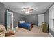 Cozy bedroom with ceiling fan, ample closet space, and a comfortable bed at 179 Carrie Dr, Archer Lodge, NC 27527