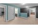 Open bonus room with multiple interior doors and neutral carpet at 179 Carrie Dr, Archer Lodge, NC 27527