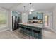 Charming kitchen with granite countertops, stainless steel appliances, and seating island at 179 Carrie Dr, Archer Lodge, NC 27527