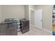 Well-lit laundry area with modern washer and dryer units at 179 Carrie Dr, Archer Lodge, NC 27527