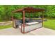 Inviting outdoor kitchen with a built-in grill, perfect for enjoying meals outdoors at 179 Carrie Dr, Archer Lodge, NC 27527