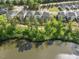 Neighborhood aerial view showing proximity to a lake and walking trail at 1824 Amberly Ledge Way, Cary, NC 27519