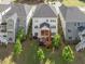 Aerial view of the home showcasing the backyard, deck, and proximity to neighboring houses in the community at 1824 Amberly Ledge Way, Cary, NC 27519