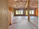 Unfinished basement featuring exposed ceiling and wooden frame structure at 1824 Amberly Ledge Way, Cary, NC 27519