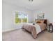 Bright bedroom with large window and scenic views at 1824 Amberly Ledge Way, Cary, NC 27519