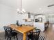 Dining area with view to the kitchen area, stainless steel appliances and a bright open concept feel for Gathering gathering at 1824 Amberly Ledge Way, Cary, NC 27519