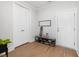 Organized mud room with storage for shoes, accessories, and skateboards at 1824 Amberly Ledge Way, Cary, NC 27519