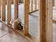 Close-up of unfinished basement plumbing and framework, highlighting building progress at 1824 Amberly Ledge Way, Cary, NC 27519