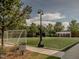 Well-maintained community soccer field with artificial turf and netting, perfect for recreation at 1824 Amberly Ledge Way, Cary, NC 27519