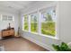 Stunning lake view from a bright room with hardwood floors and large windows at 1824 Amberly Ledge Way, Cary, NC 27519