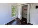 Bedroom has hardwood floors, crown molding, closet with bi-fold doors, and natural light at 1846 Forest Wood Rd, Rocky Mount, NC 27804