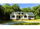 Charming home with well-manicured lawn, dormer windows, and a welcoming front porch at 1846 Forest Wood Rd, Rocky Mount, NC 27804