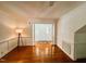 Spacious living room featuring hardwood floors, and a bright foyer entrance at 1846 Forest Wood Rd, Rocky Mount, NC 27804