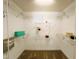 Spacious walk-in closet features a carpeted floor and adjustable white shelving units for organization at 1846 Forest Wood Rd, Rocky Mount, NC 27804