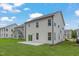 The backyard is newly sodded and features beige siding, offering a modern touch at 2007 Seford Dr, Durham, NC 27703