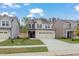 Delightful two-story home with a wide driveway and manicured front lawn at 2007 Seford Dr, Durham, NC 27703