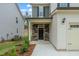 Elegant home entryway featuring a stone facade and a covered porch at 2007 Seford Dr, Durham, NC 27703