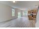 Bright open kitchen featuring light wood cabinets, granite countertops, and stainless steel appliances at 2007 Seford Dr, Durham, NC 27703