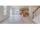 Bright open kitchen featuring light wood cabinets, granite countertops, and stainless steel appliances at 2007 Seford Dr, Durham, NC 27703