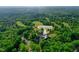 Overhead shot of Treyburn Country Club featuring a golf course surrounded by lush trees at 201 Johnstone Ct Ct, Durham, NC 27712