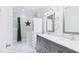 Bathroom with double sink vanity, modern fixtures, and a built in storage cabinet at 201 Johnstone Ct Ct, Durham, NC 27712