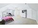 Spacious bedroom with dormer window, ceiling fan, TV and desk at 201 Johnstone Ct Ct, Durham, NC 27712