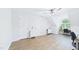 Bright room with hardwood floors, built-in shelves, and natural light at 201 Johnstone Ct Ct, Durham, NC 27712